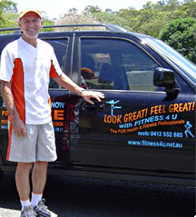 Ron next to his car